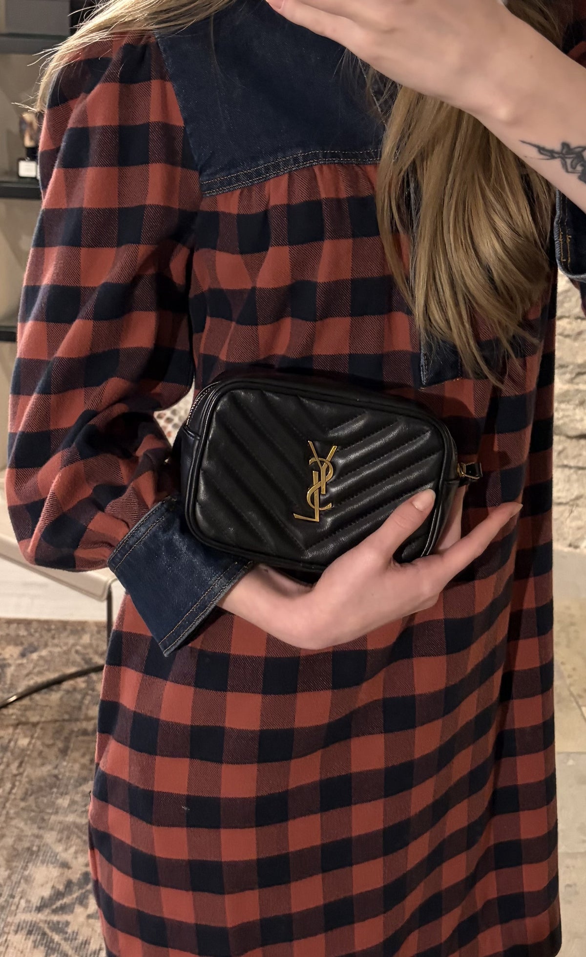 Check dress with denim details and a Saint Laurent bag