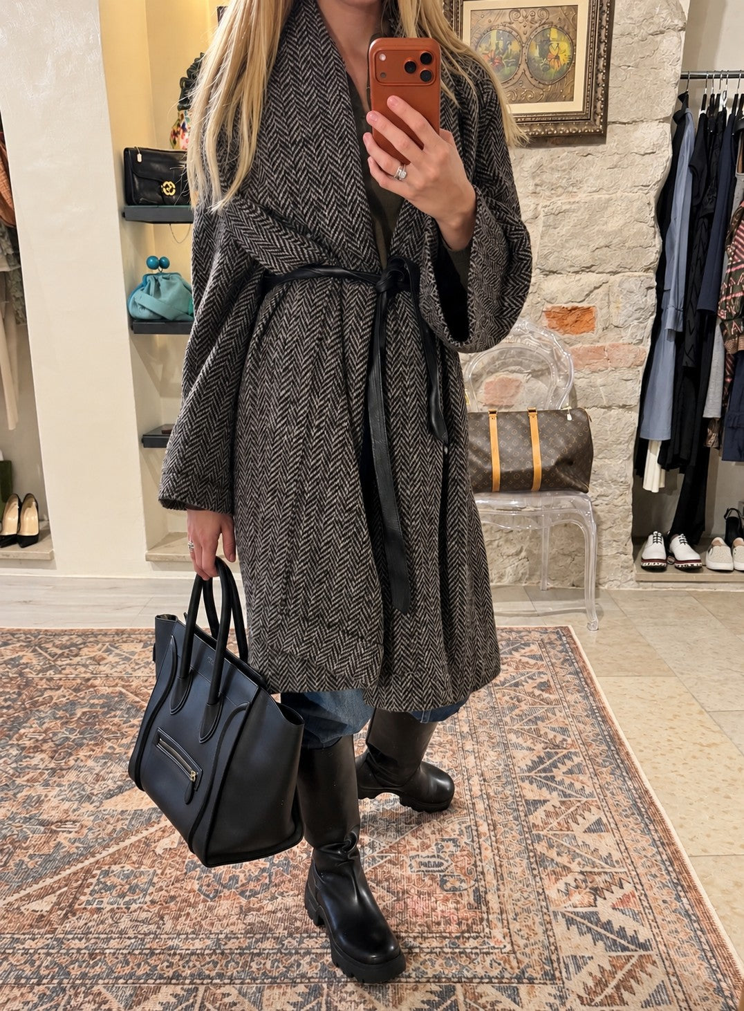 Vivienne Westwood herringbone coat and a Celine Mini Luggage bag